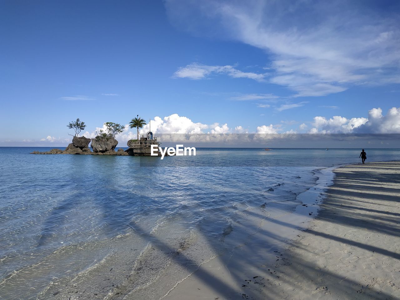 water, sky, sea, ocean, shore, horizon, land, beach, nature, cloud, scenics - nature, coast, beauty in nature, body of water, reflection, travel destinations, tranquility, wave, blue, tranquil scene, travel, sand, architecture, day, horizon over water, holiday, outdoors, vacation, sunlight, trip, bay, environment, tourism, landscape, idyllic, nautical vessel, pier, vehicle, no people, island, seascape, ship, built structure, transportation, tropical climate