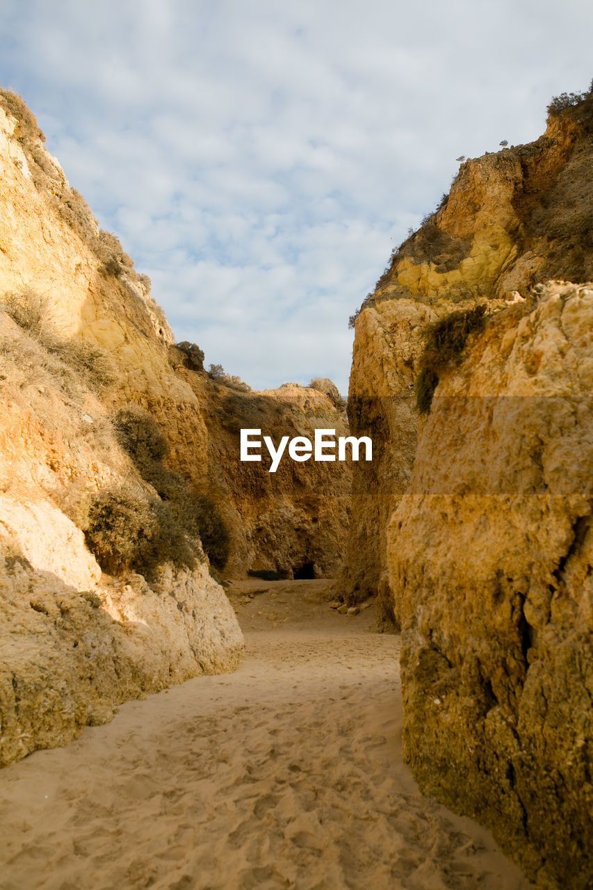 View of rock formation on the beach in portugal. 