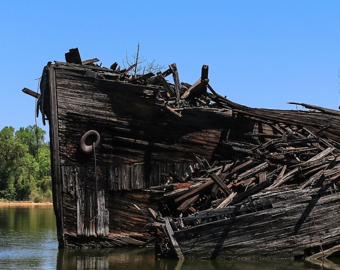 Damaged ship in river