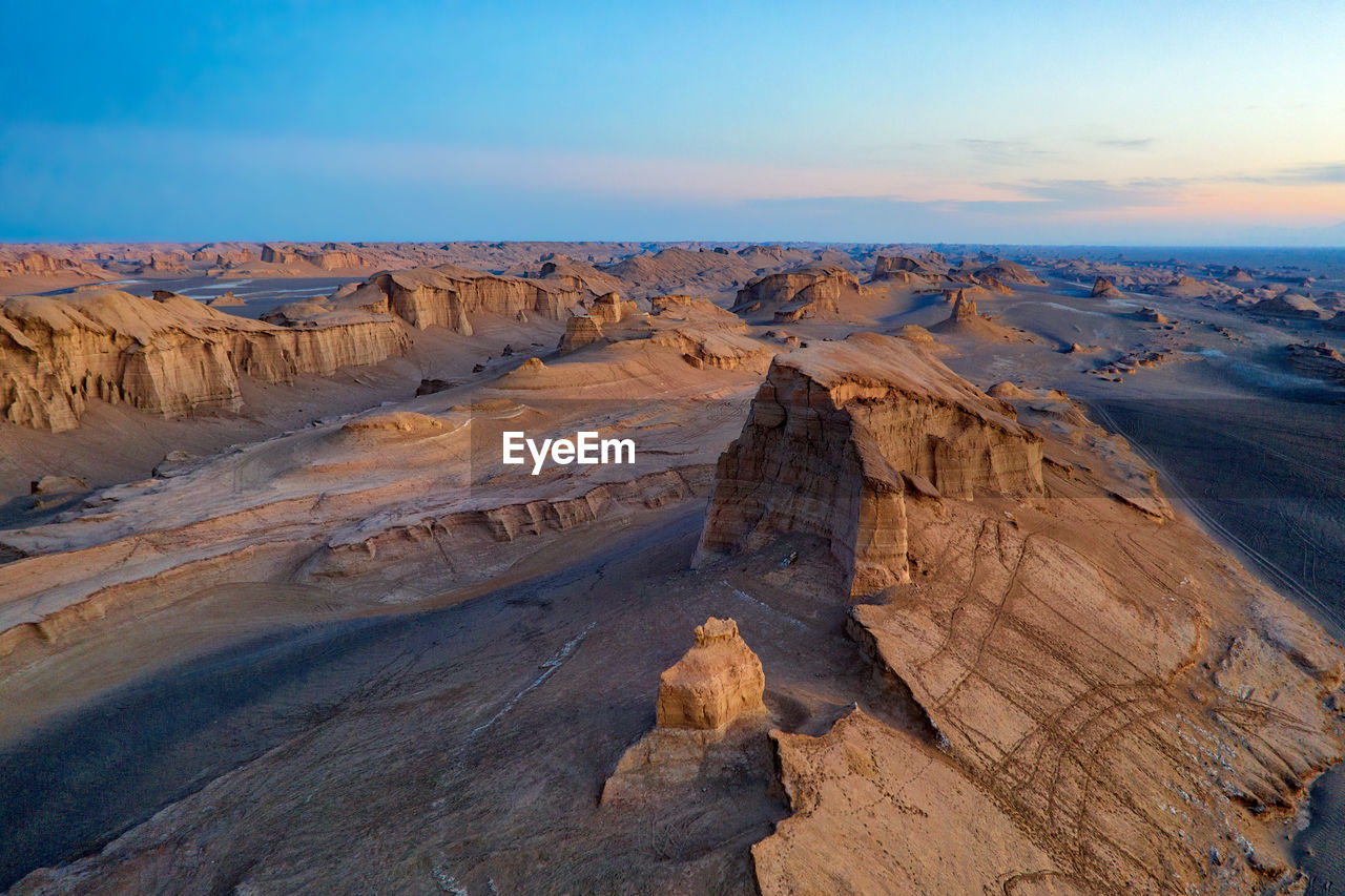 SCENIC VIEW OF ROCK FORMATIONS AGAINST SKY