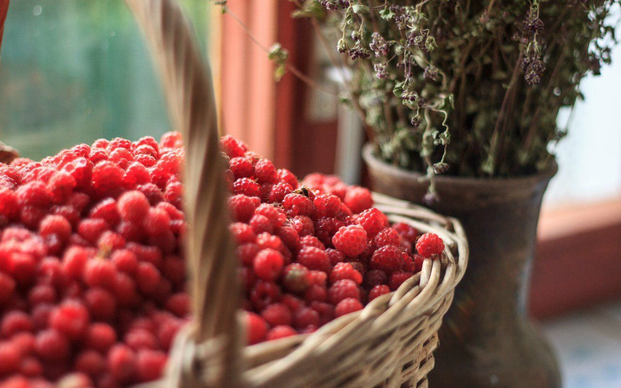 Raspberries in wicker basket