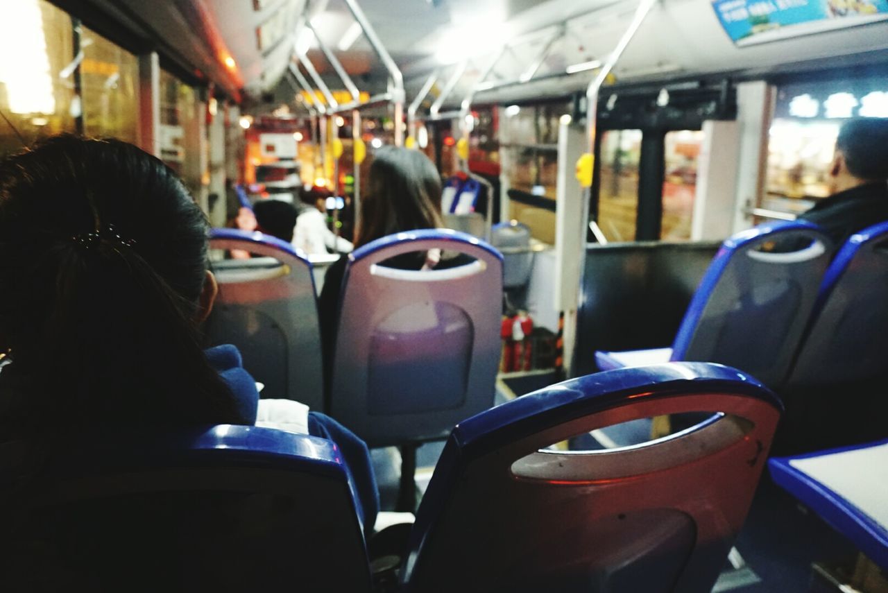 Elevated view of people sitting in bus