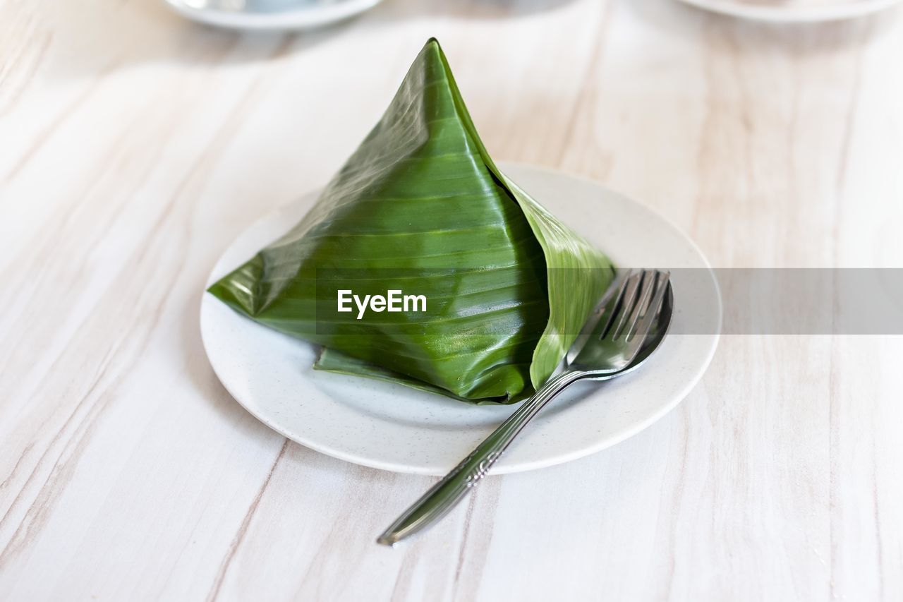 High angle view of nasi lemak in plate on table