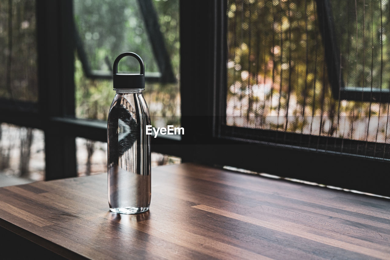 Water bottle on table.