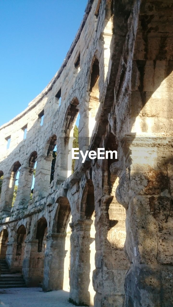 LOW ANGLE VIEW OF OLD RUINS