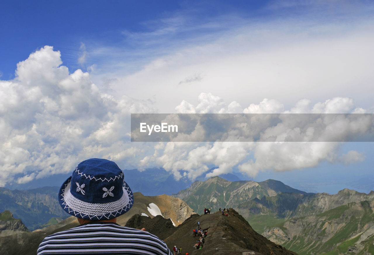 Man in mountains against sky