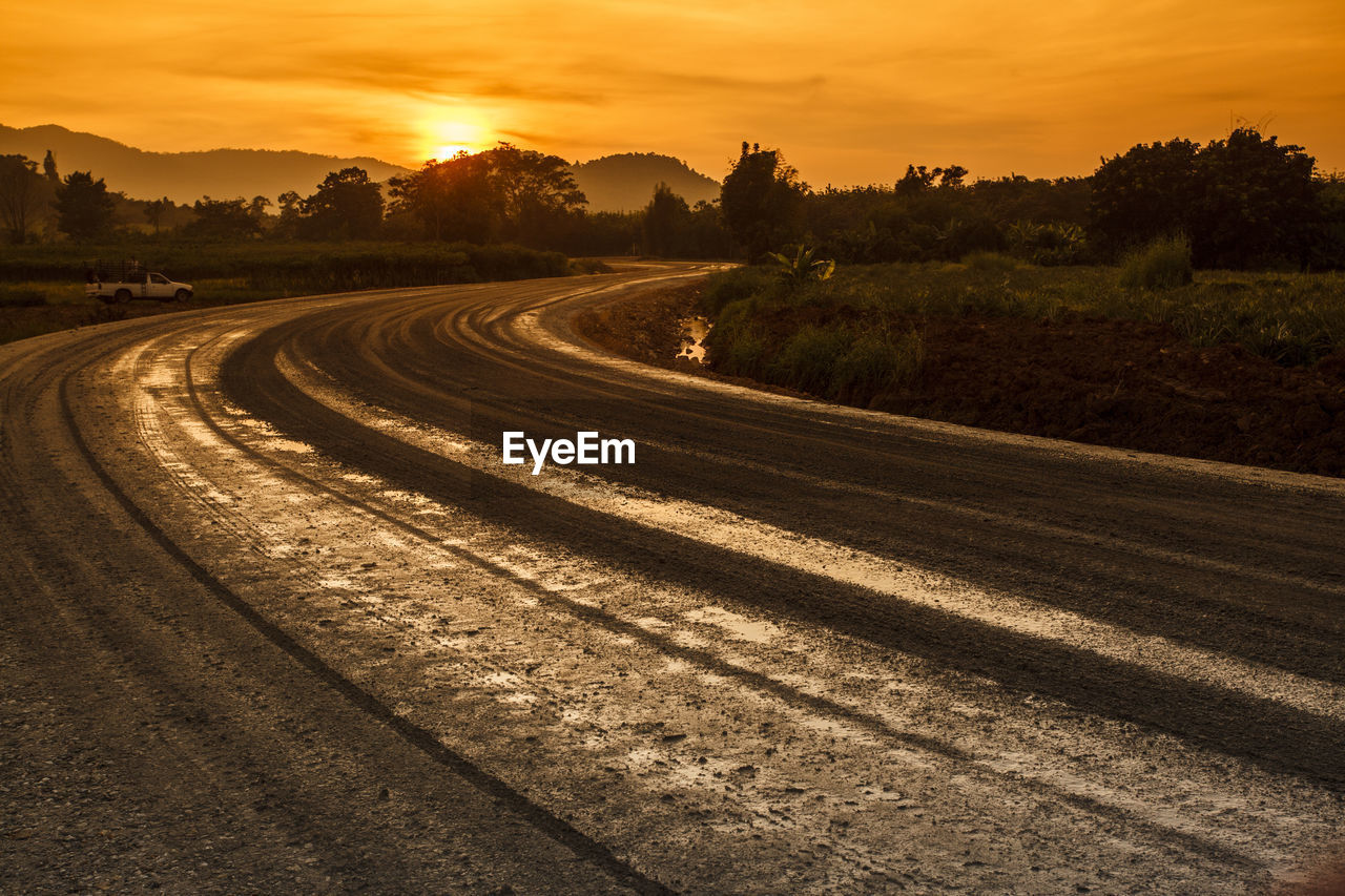 Scenic view of landscape against sky during sunset