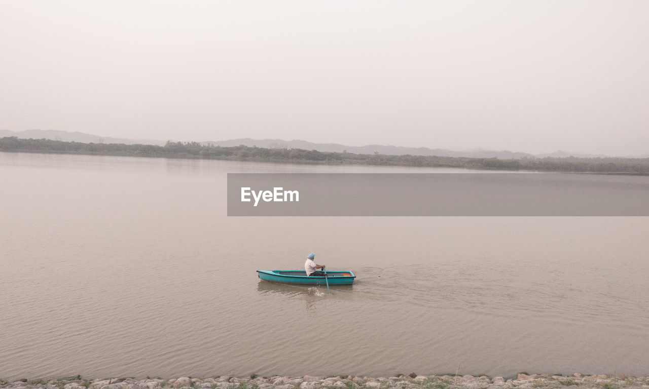 VIEW OF LAKE AGAINST SKY