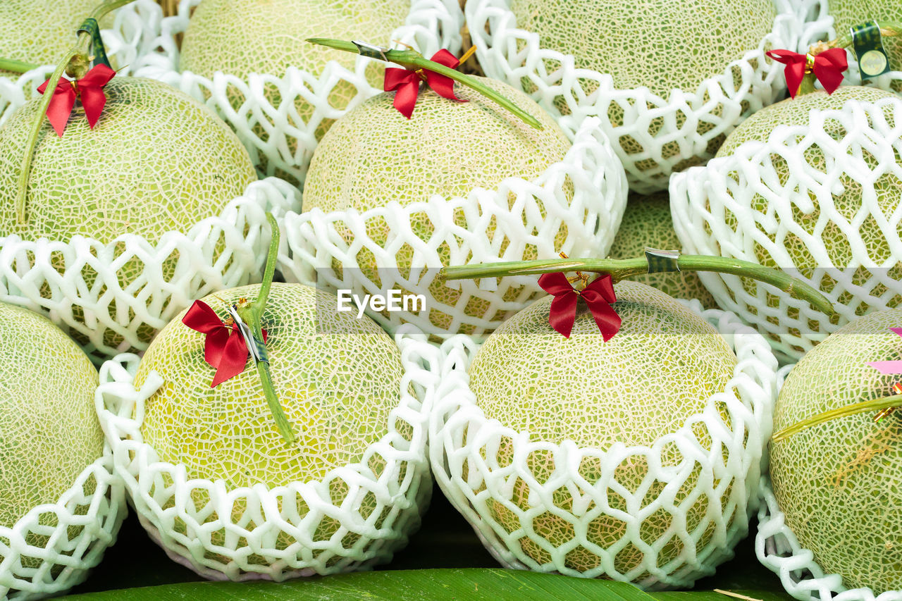 Close-up of fruits on display at market stall