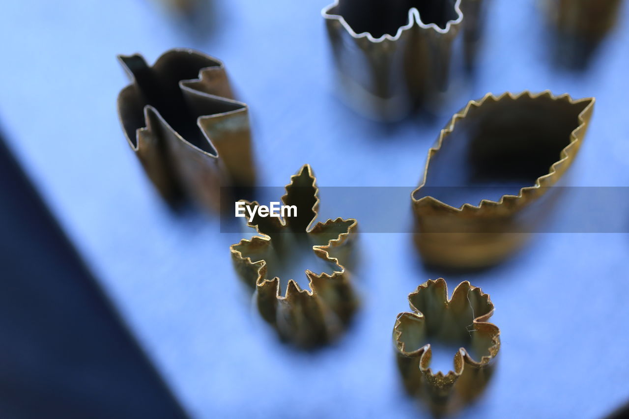 High angle view of cookie cutters on table