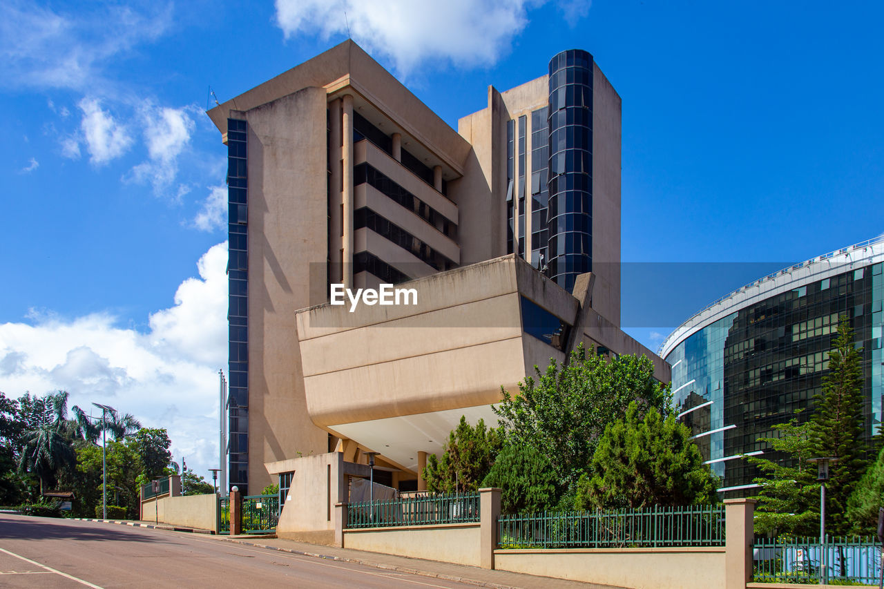 Low angle view of buildings against blue sky