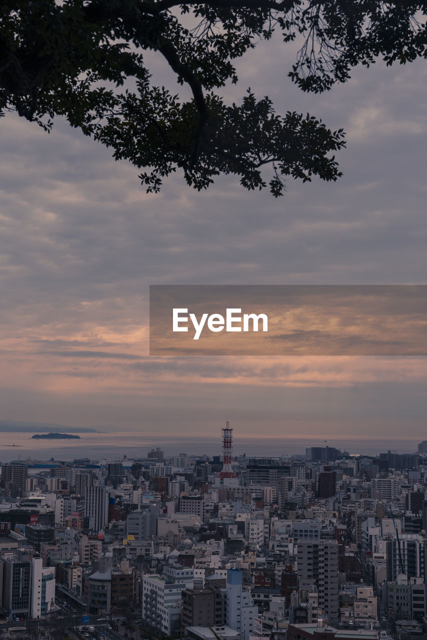 High angle view of townscape against sky at sunset