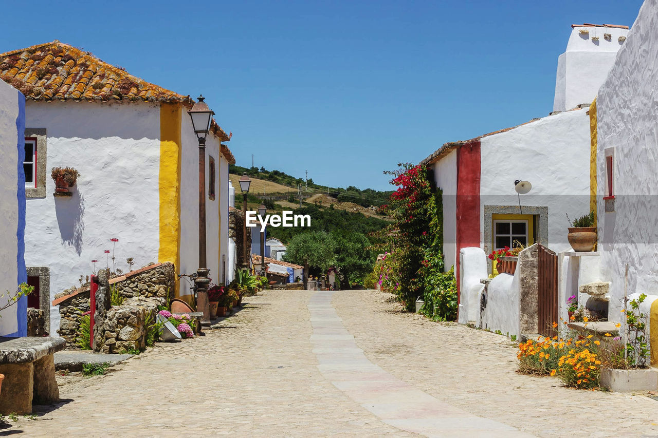 houses in town against clear sky