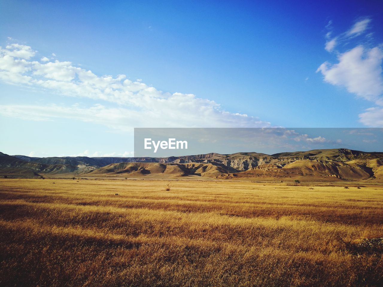 Scenic view of land against sky