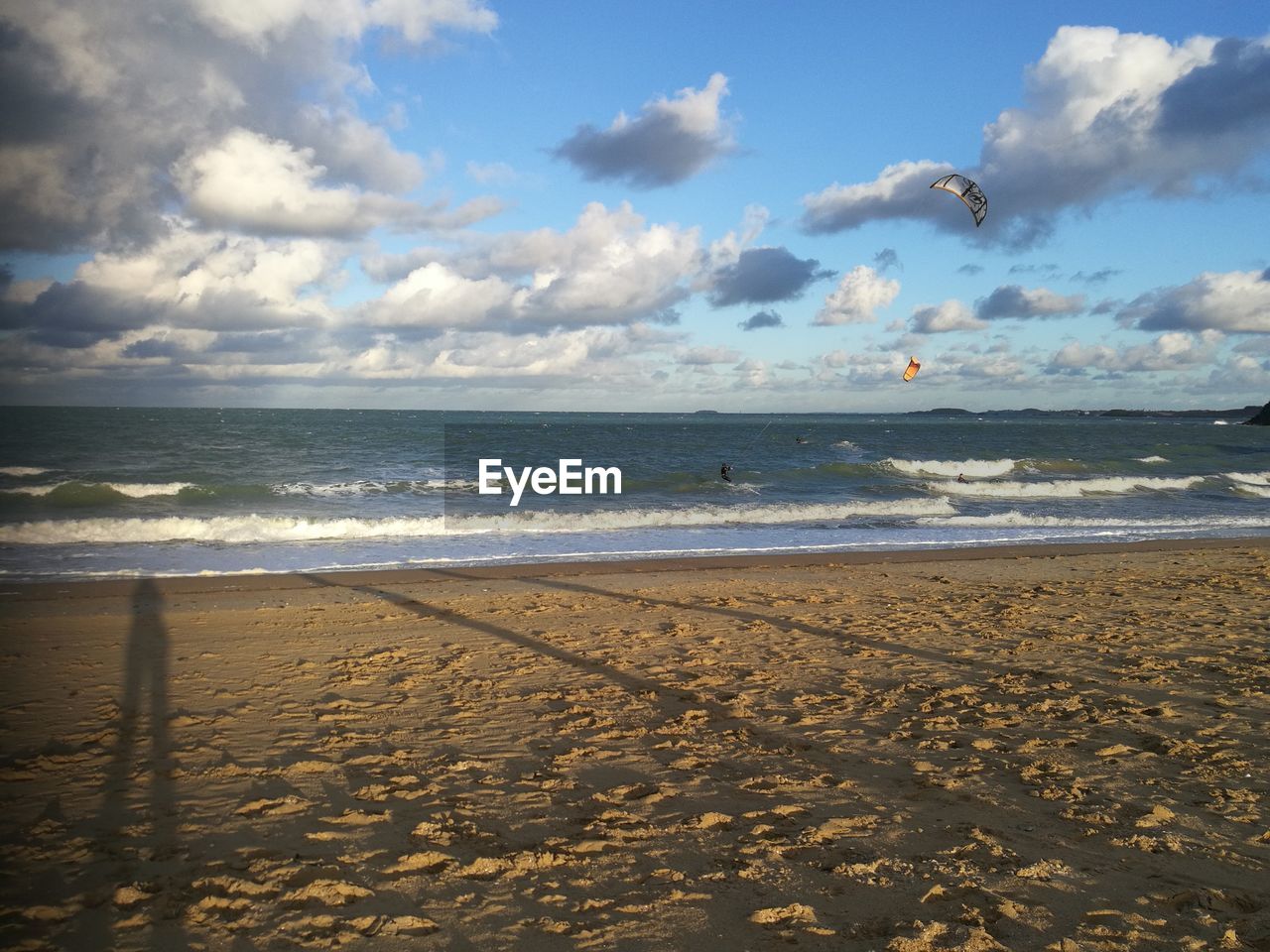 SCENIC VIEW OF BEACH BY SEA AGAINST SKY