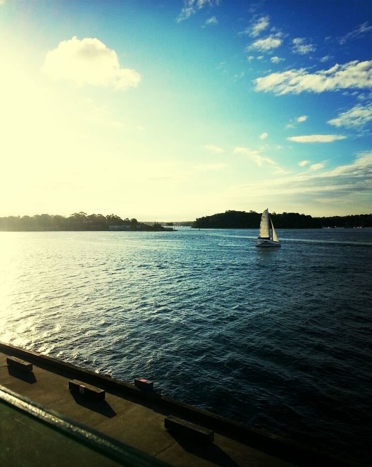 BOATS SAILING IN SEA