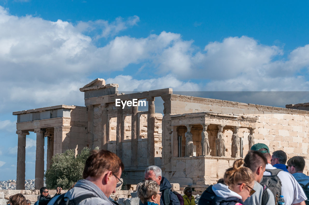 PEOPLE AT HISTORICAL BUILDING