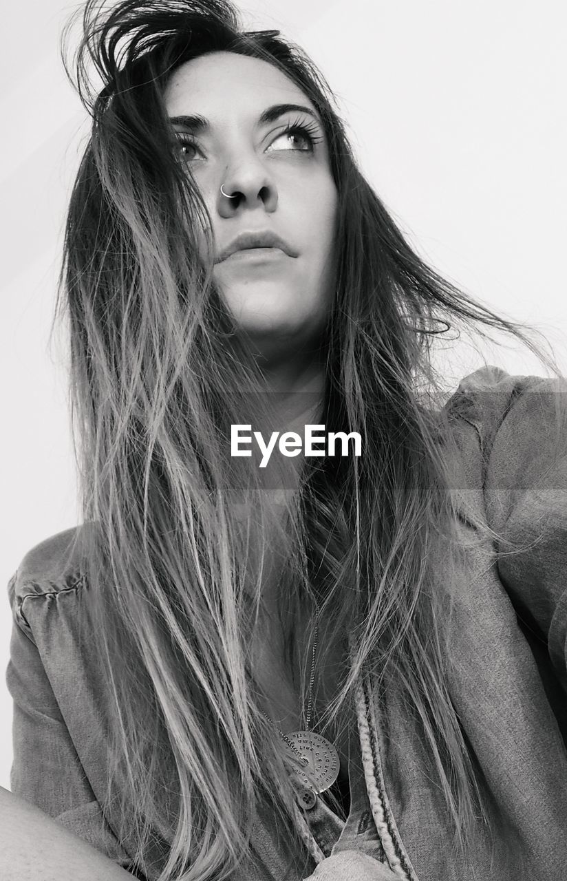 PORTRAIT OF WOMAN LOOKING AWAY