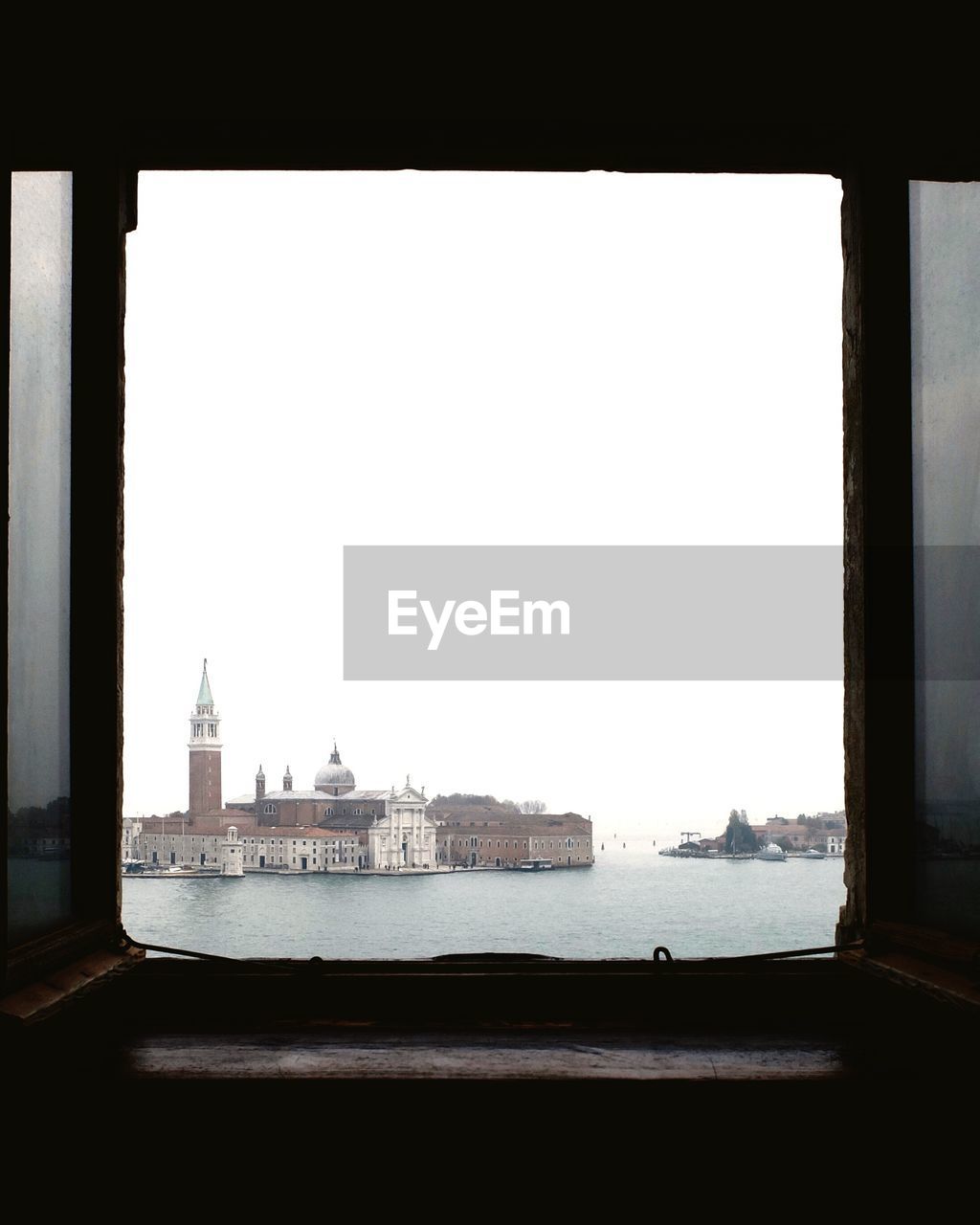 Doge palace against clear sky seen from window