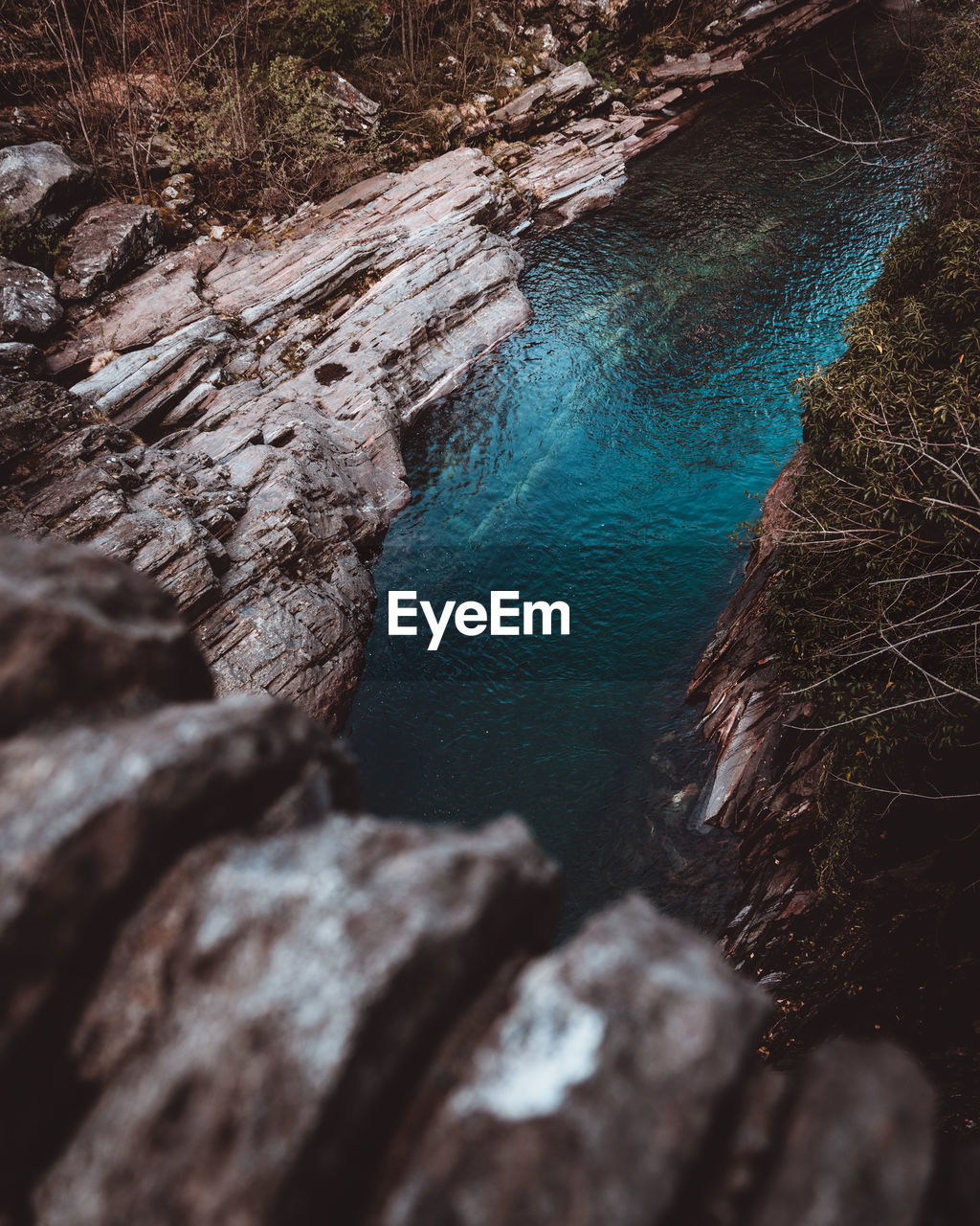 High angle view of rock formation on sea