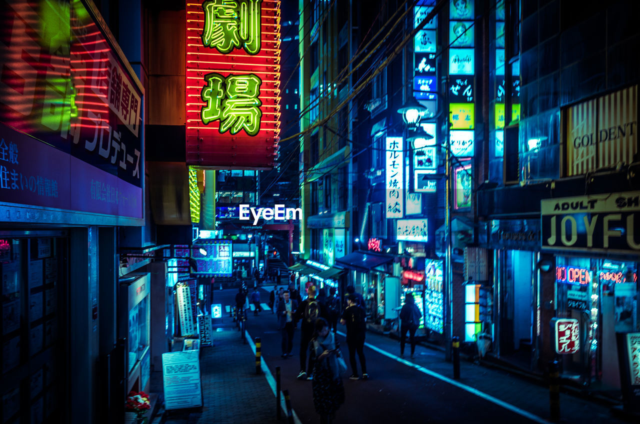 Illuminated city at night in tokyo japan