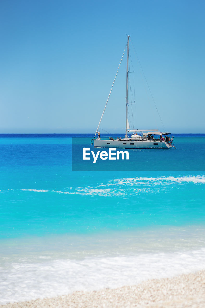 VIEW OF BOATS IN SEA