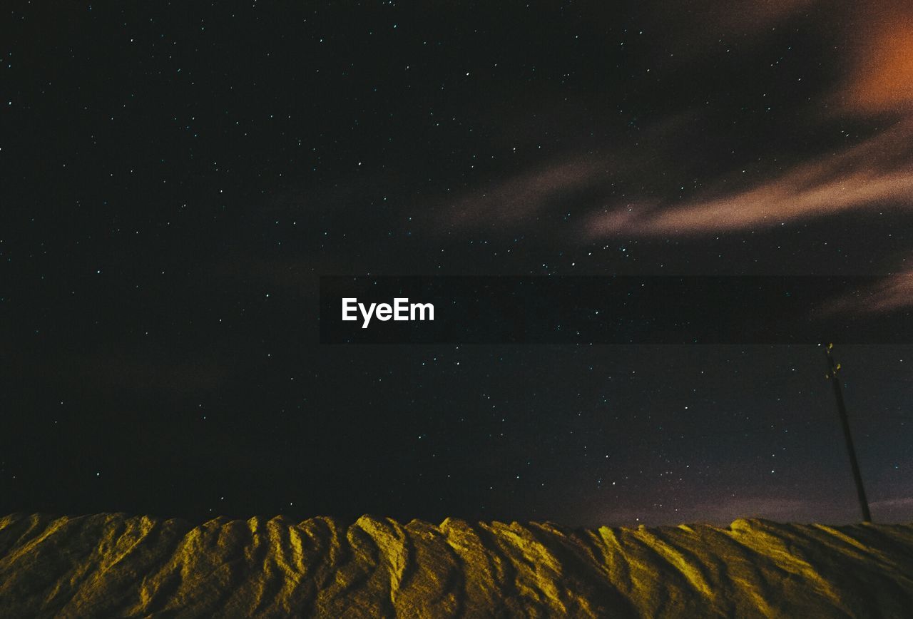 SCENIC VIEW OF STAR FIELD AGAINST SKY AT NIGHT