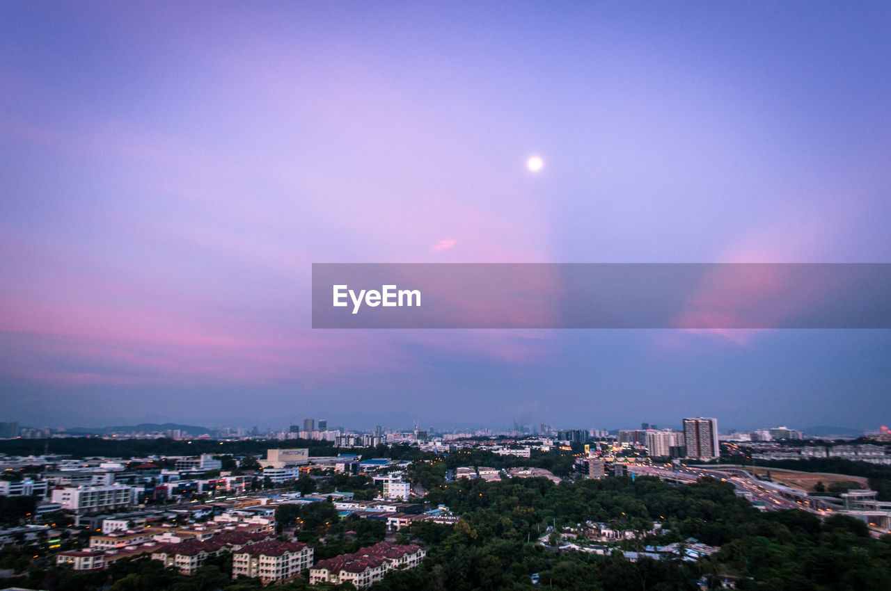 VIEW OF CITY AT NIGHT