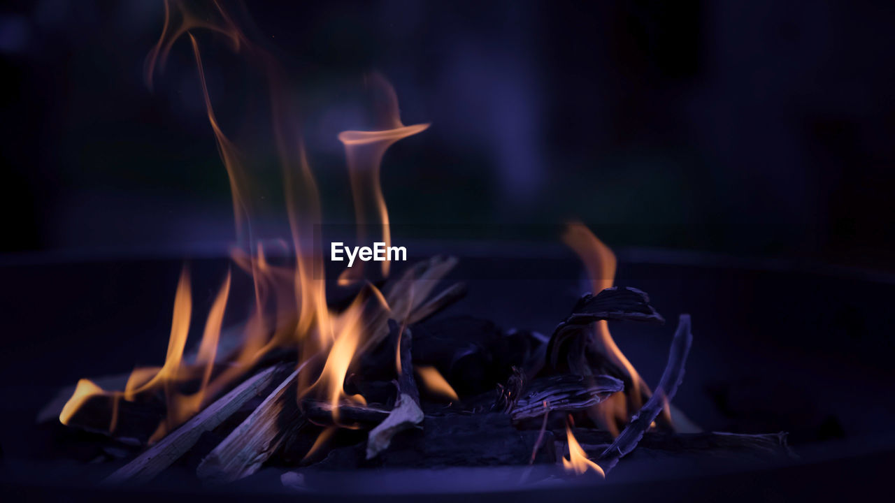 Close-up of burning candles