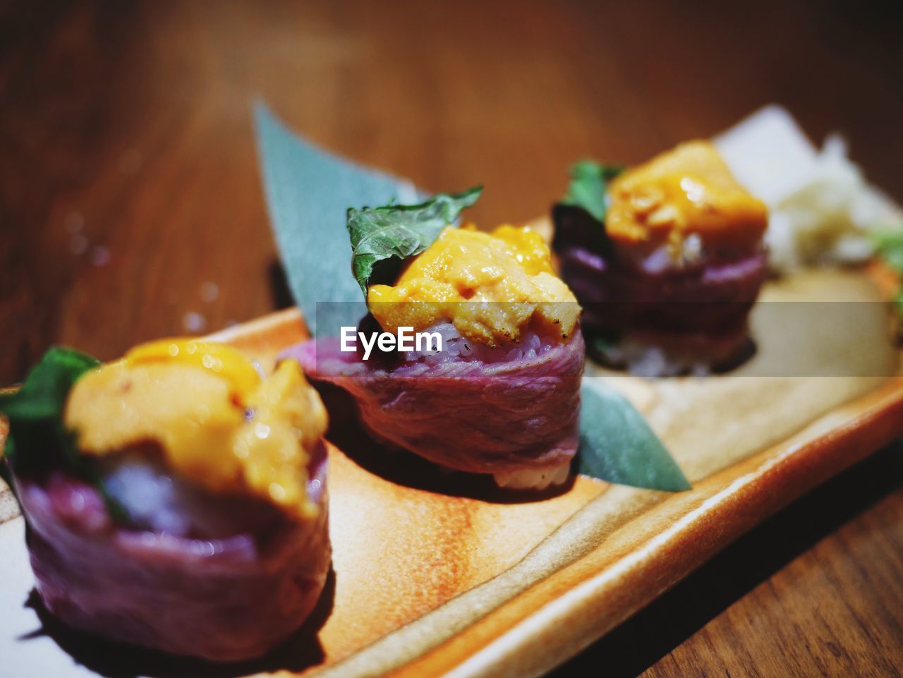 Close-up of sushi served on table