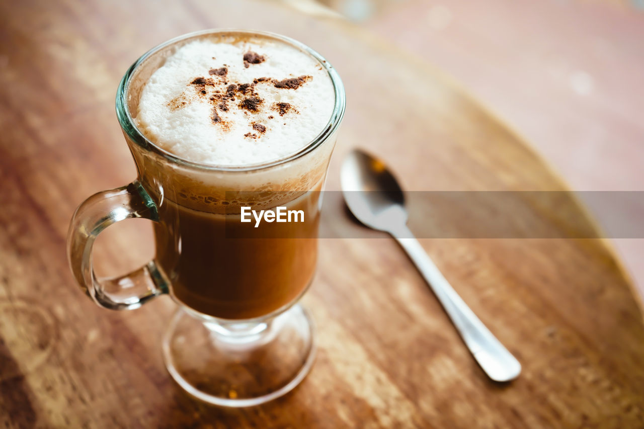 Close-up of coffee cup on table