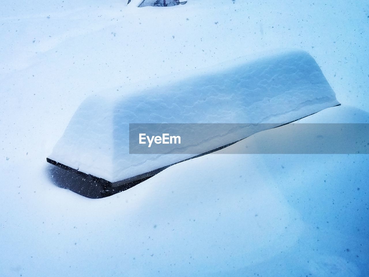 CLOSE-UP OF SNOW ON WHITE BACKGROUND