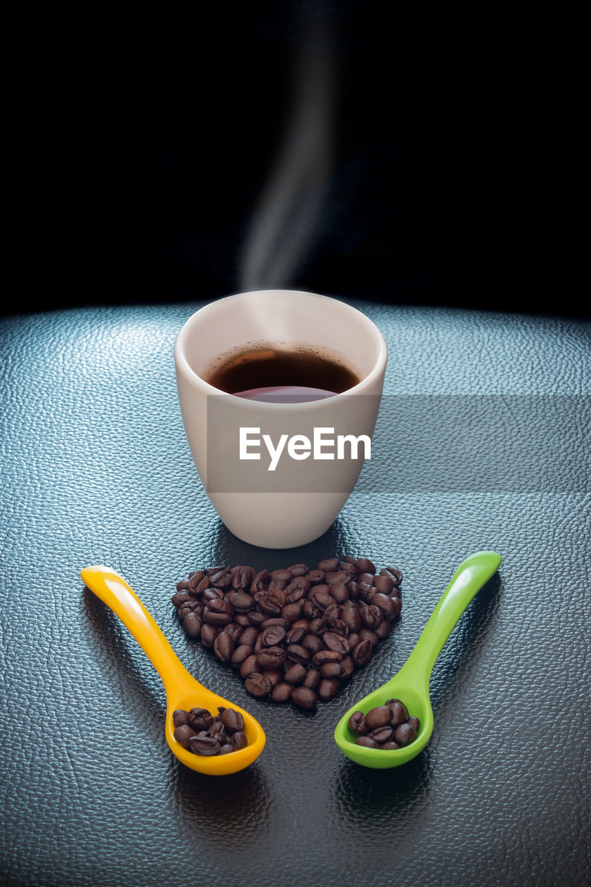 High angle view of coffee cup on table