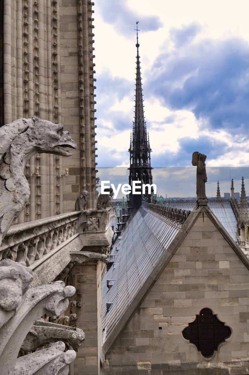 Gargoyle of notre dame cathedral is located at the roof top of the cathedral  