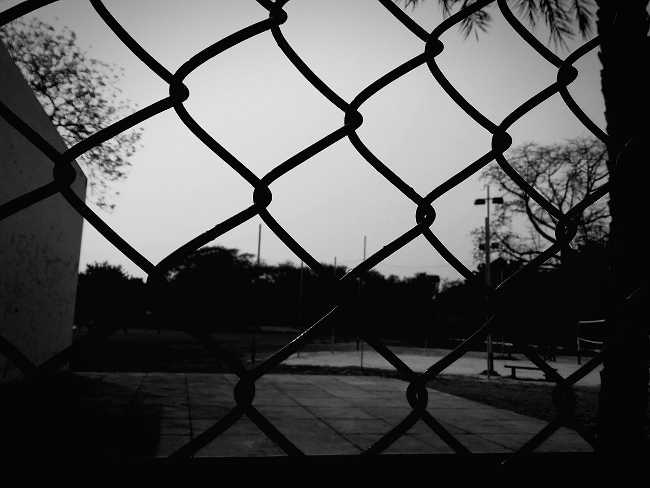 Close-up of chainlink fence against clear sky