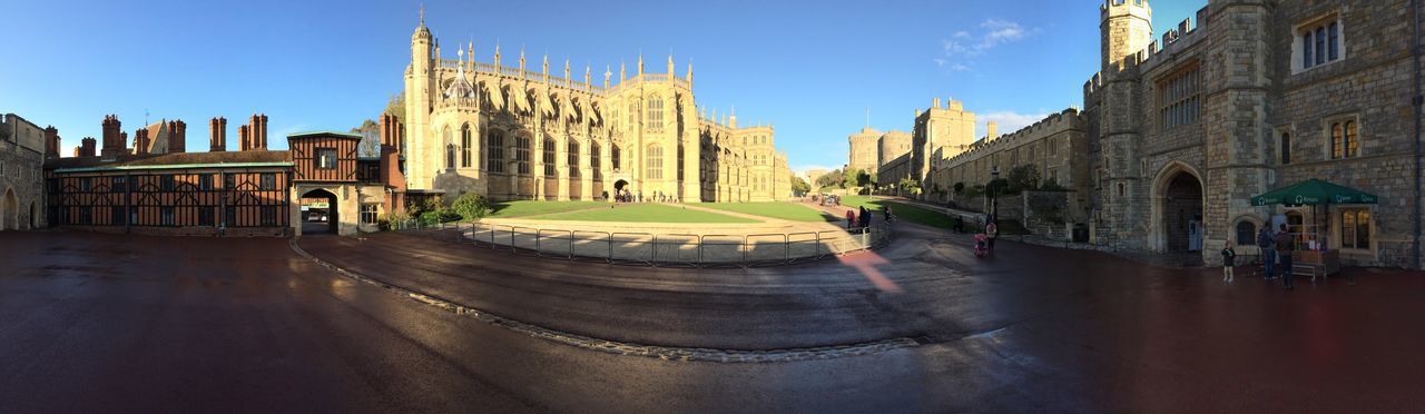 Panoramic view of buildings in city against sky