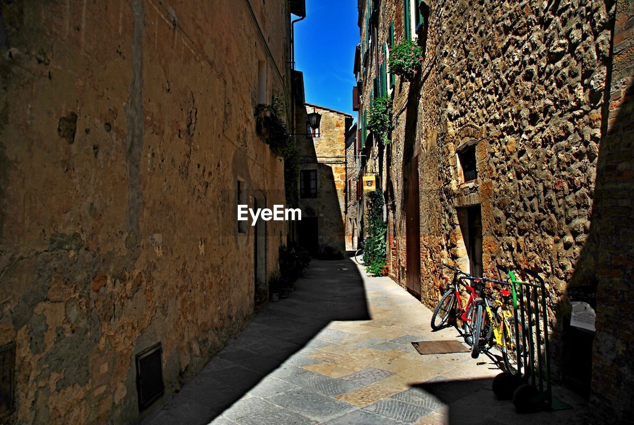 ALLEY AMIDST BUILDINGS