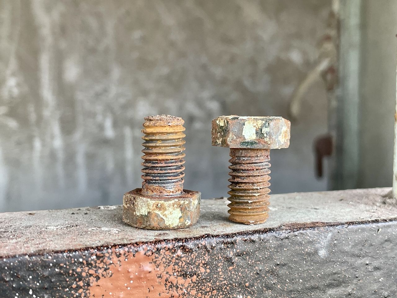 CLOSE-UP OF RUSTY STACK ON METAL