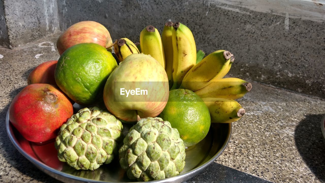 Close-up of fruits in plate