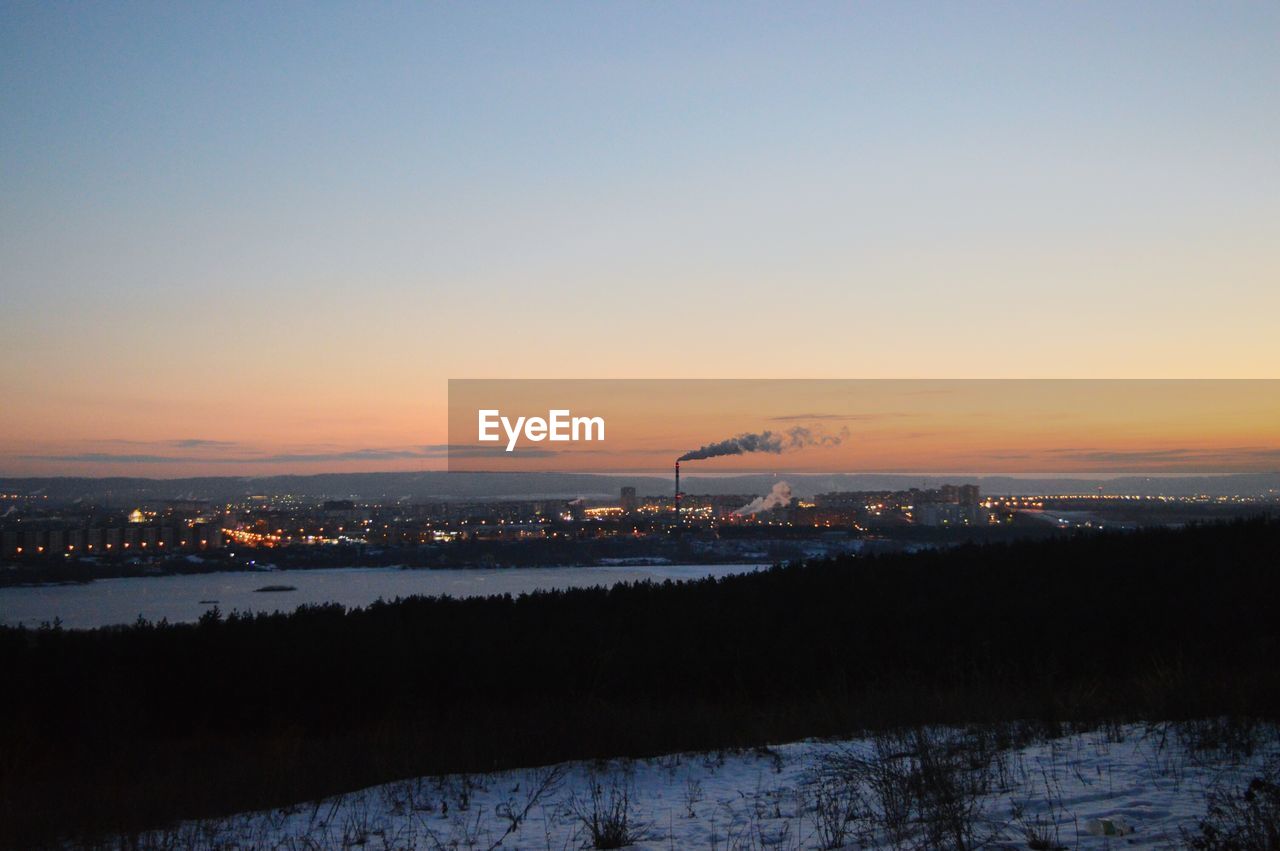 Silhouette of landscape against sky during sunset