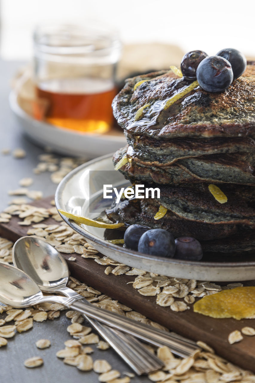 Close-up of pancakes in plate on table