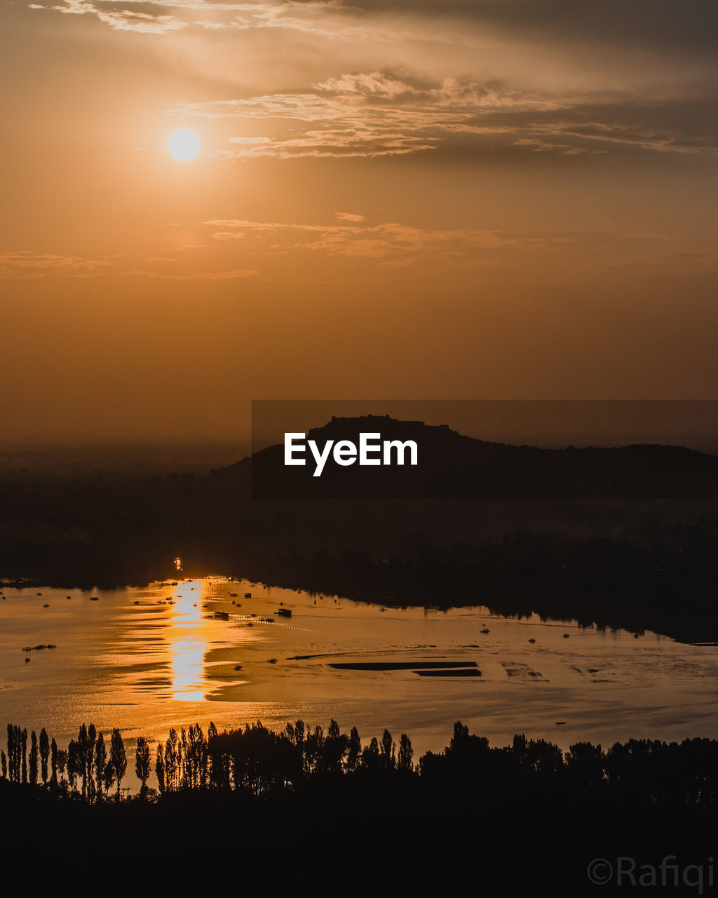 SCENIC VIEW OF SEA DURING SUNSET