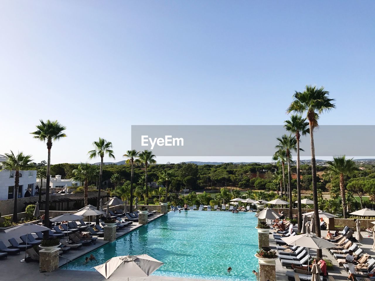 SCENIC VIEW OF SWIMMING POOL AGAINST SKY