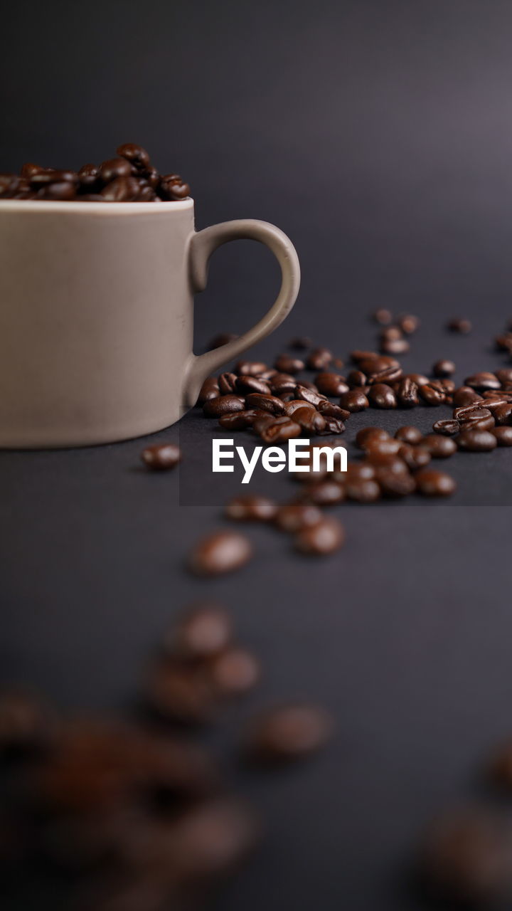 Close-up of coffee cup on table