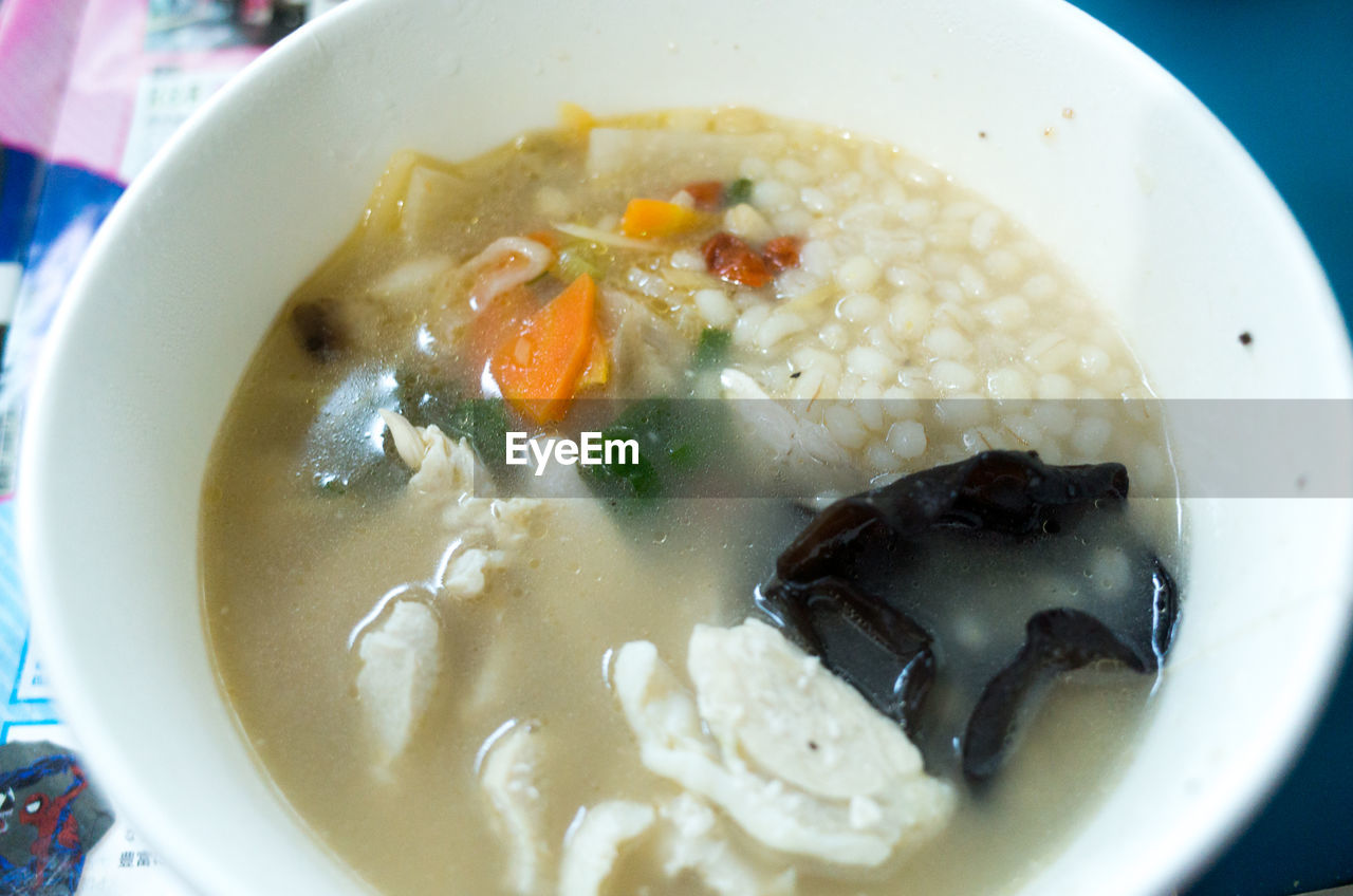 CLOSE-UP OF SOUP WITH BOWL