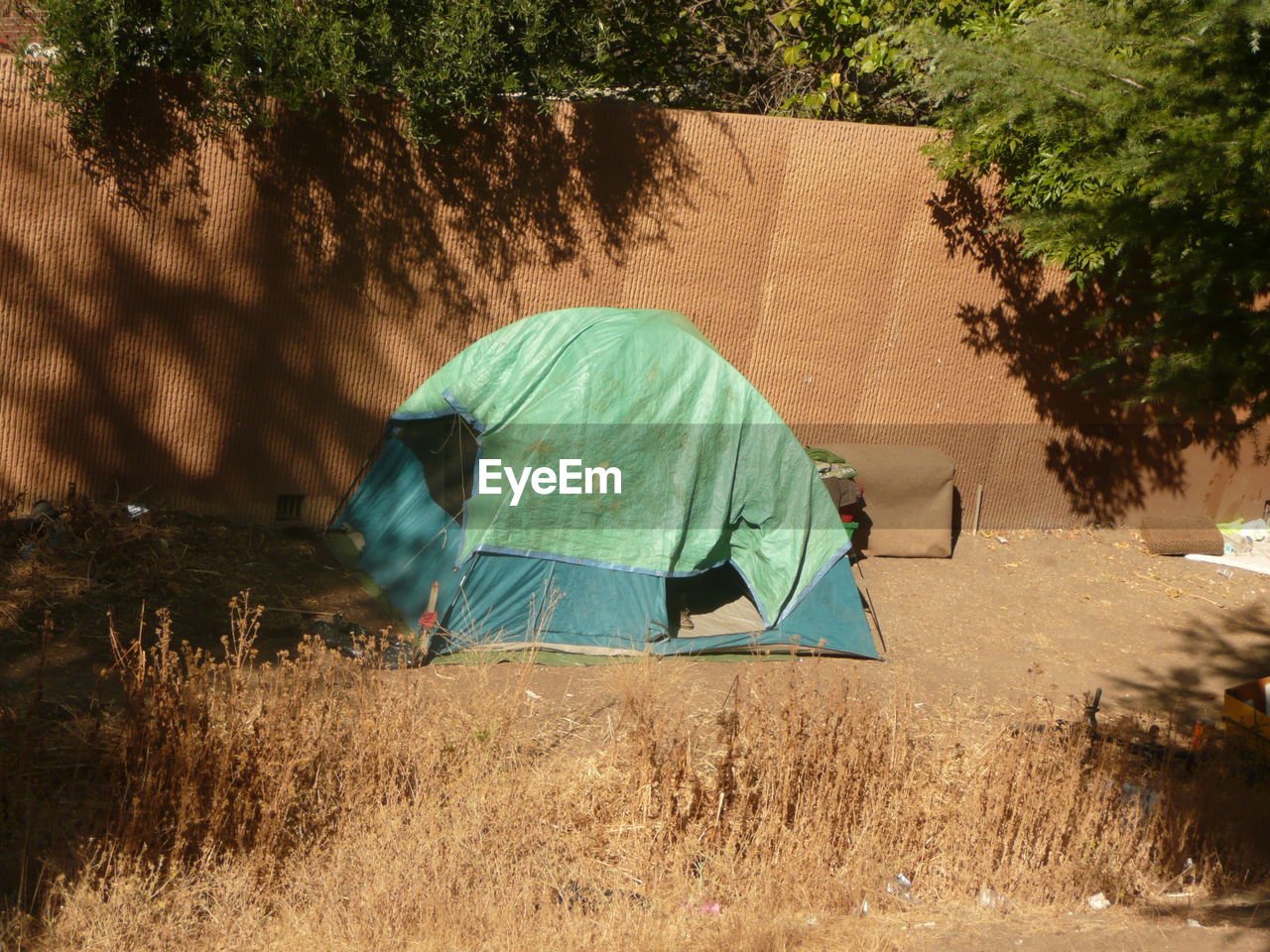 REAR VIEW OF A TENT ON THE LAND