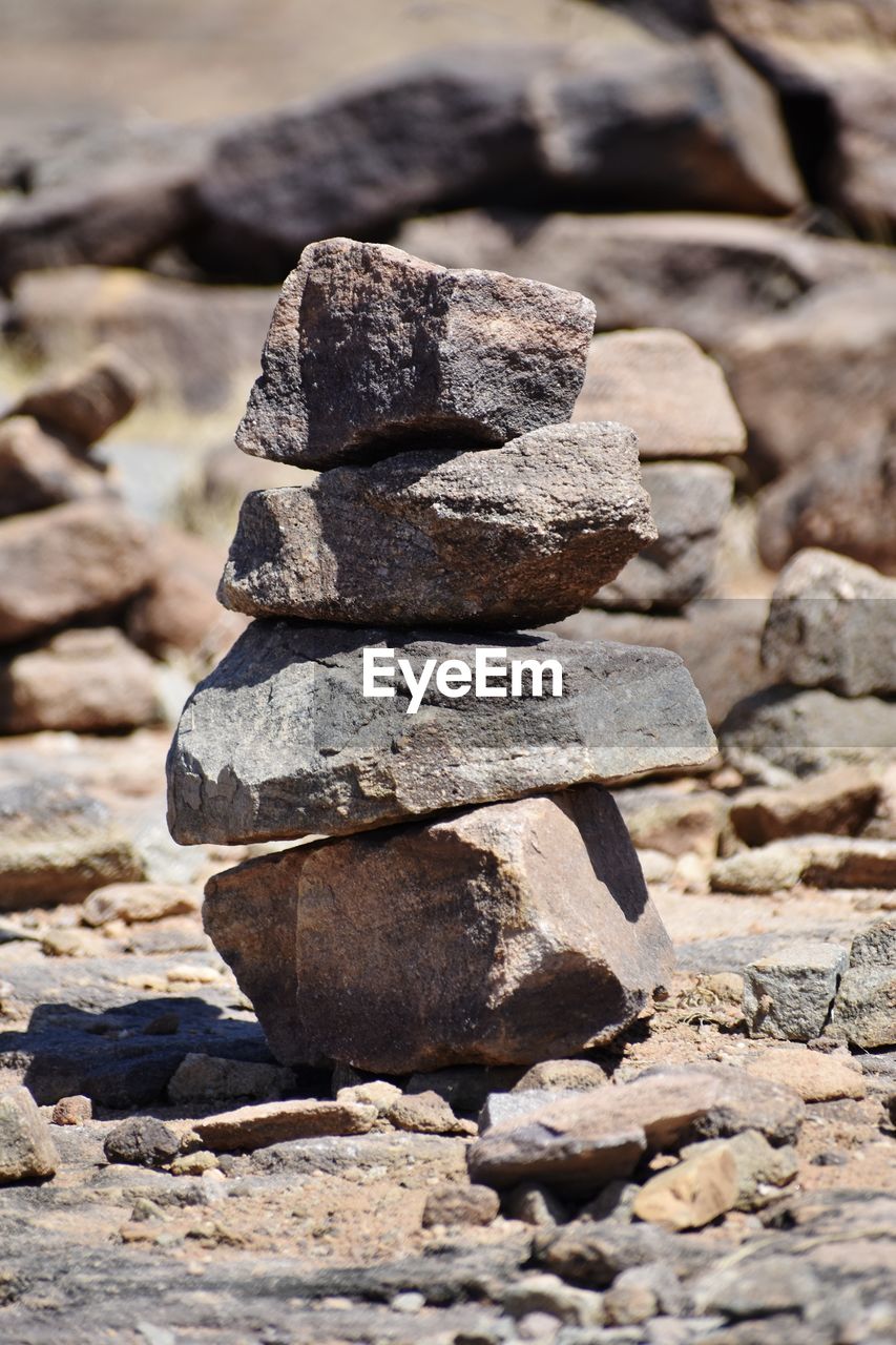 Close-up of stone stack on rock