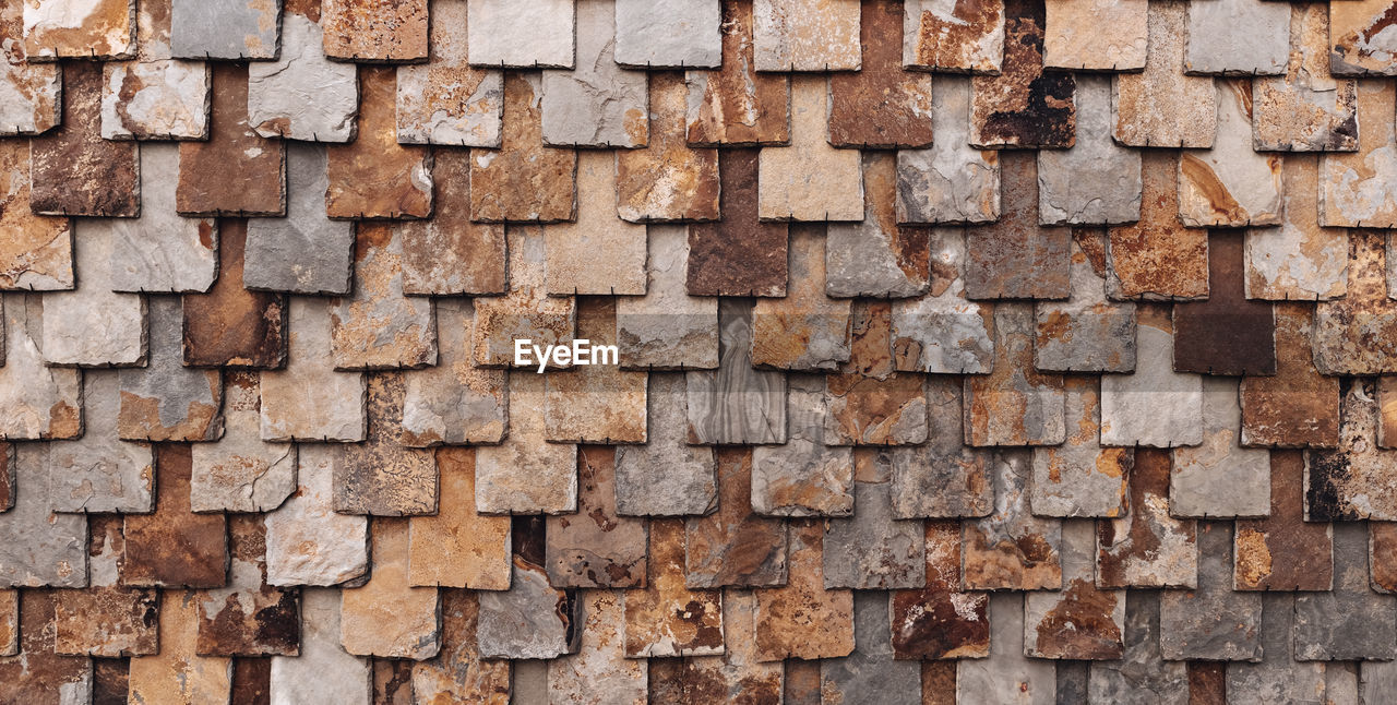 brick, brickwork, backgrounds, full frame, wall, large group of objects, pattern, abundance, textured, stone wall, no people, repetition, brown, arrangement, floor, flooring, day, architecture, wood, built structure, wall - building feature, industry, outdoors, lumber, close-up, rough, in a row, side by side, order, construction material, timber, lumber industry