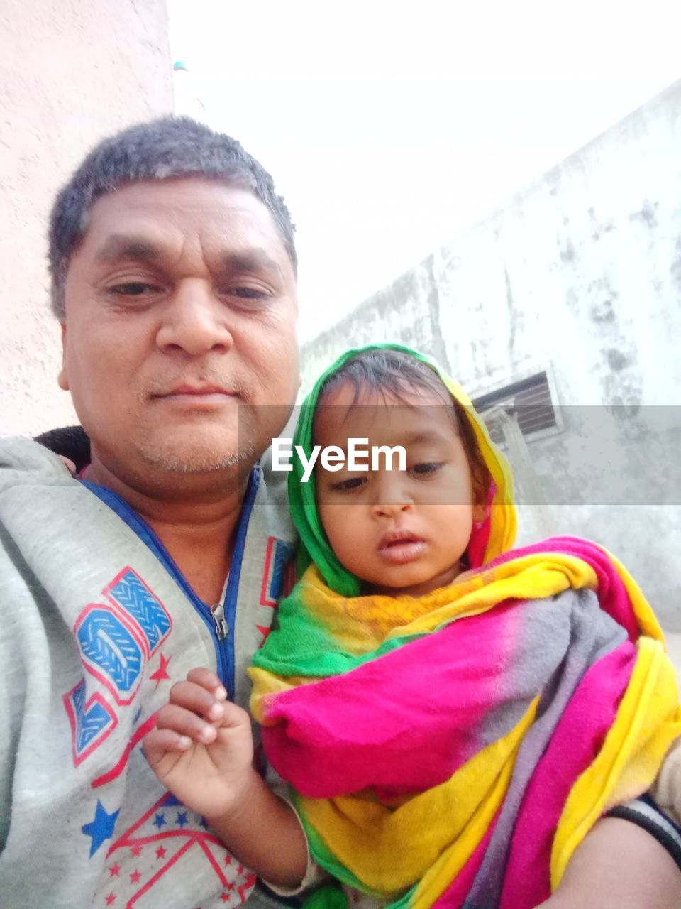 PORTRAIT OF MOTHER AND DAUGHTER WITH BABY