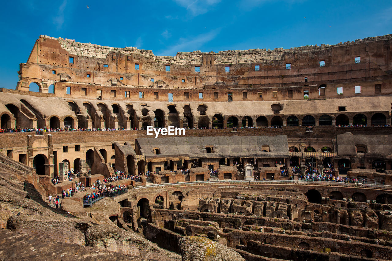 View of the seating areas and the hypogeum of the ancient colosseum in rome